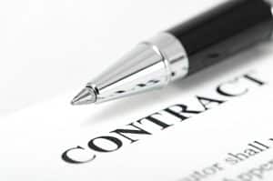 pen on top of a contract