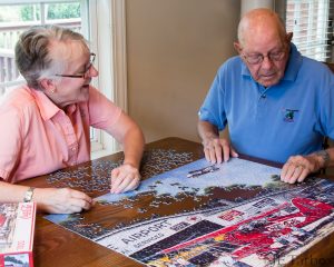 Seniors staying active with puzzle
