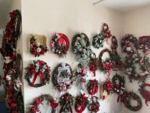 Holiday wreaths displaying Eileen Gist's floral designs.