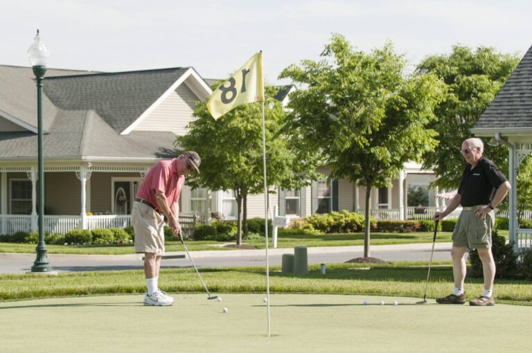 a few residents of CLV staying active on the putting green.