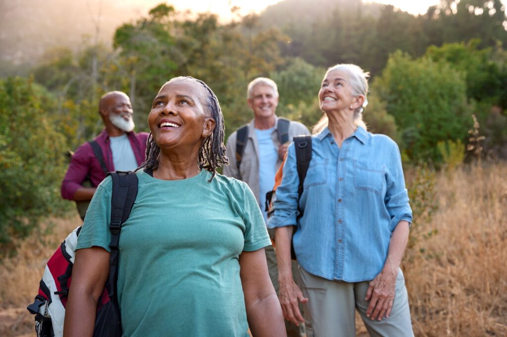group of active seniors take a hike