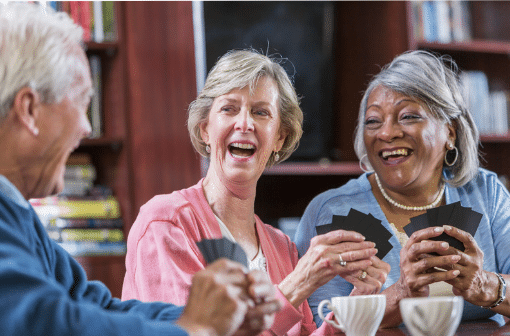 Three older adults spreading positivity.